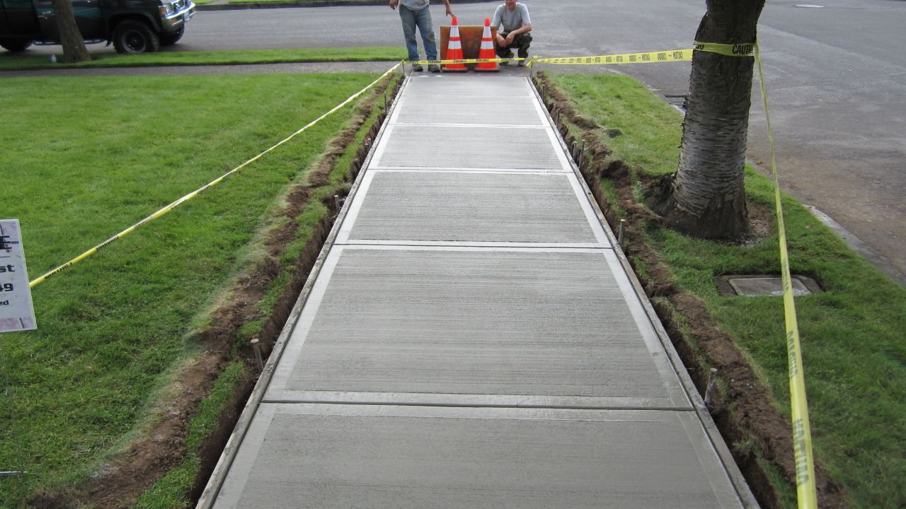How Much Does a Concrete Sidewalk Cost? Pavers Experts